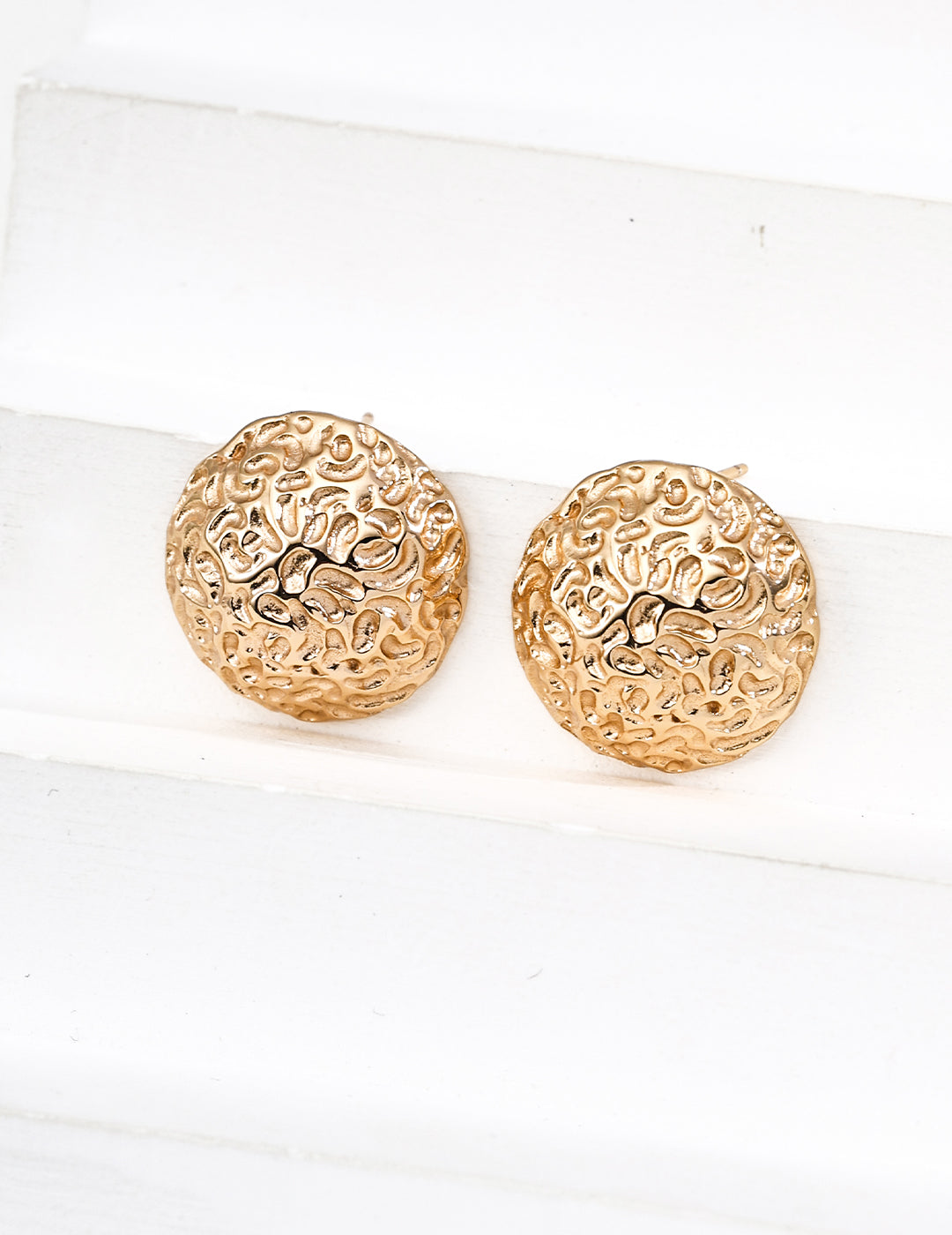 Rounded sterling silver stud earrings, gold