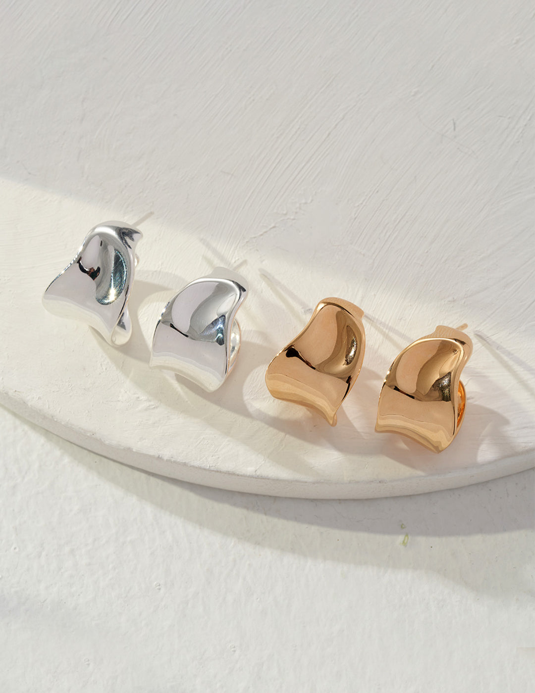 Enchanting Fluid Sterling Silver Hoop Earrings