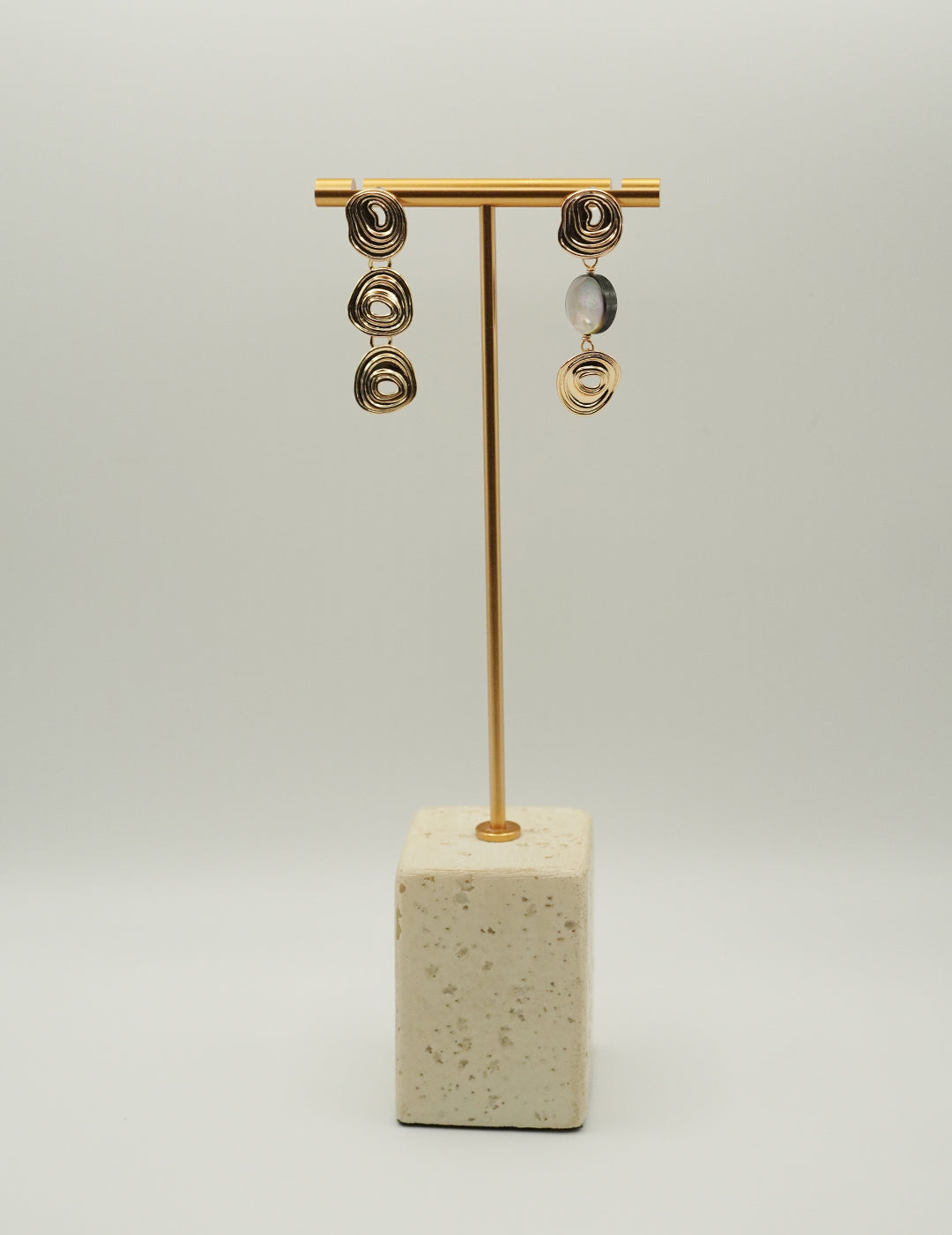 Gold asymmetrical earrings with shell drop – modern sculptural design by Twiggy Jewelry.