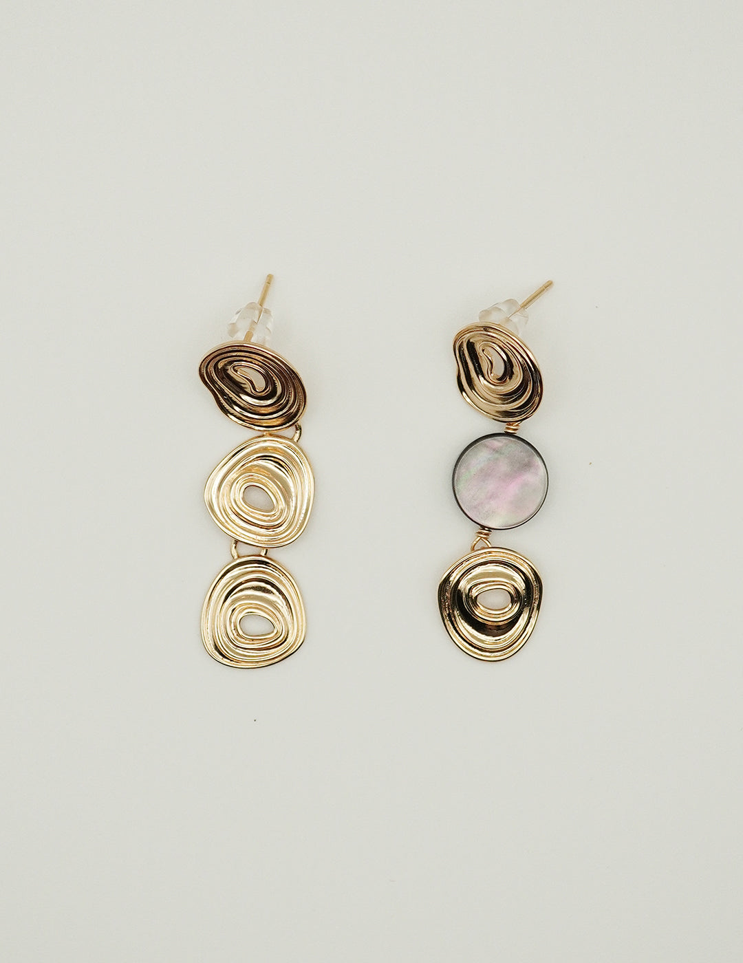 Gold asymmetrical earrings with shell drop – modern sculptural design by Twiggy Jewelry.