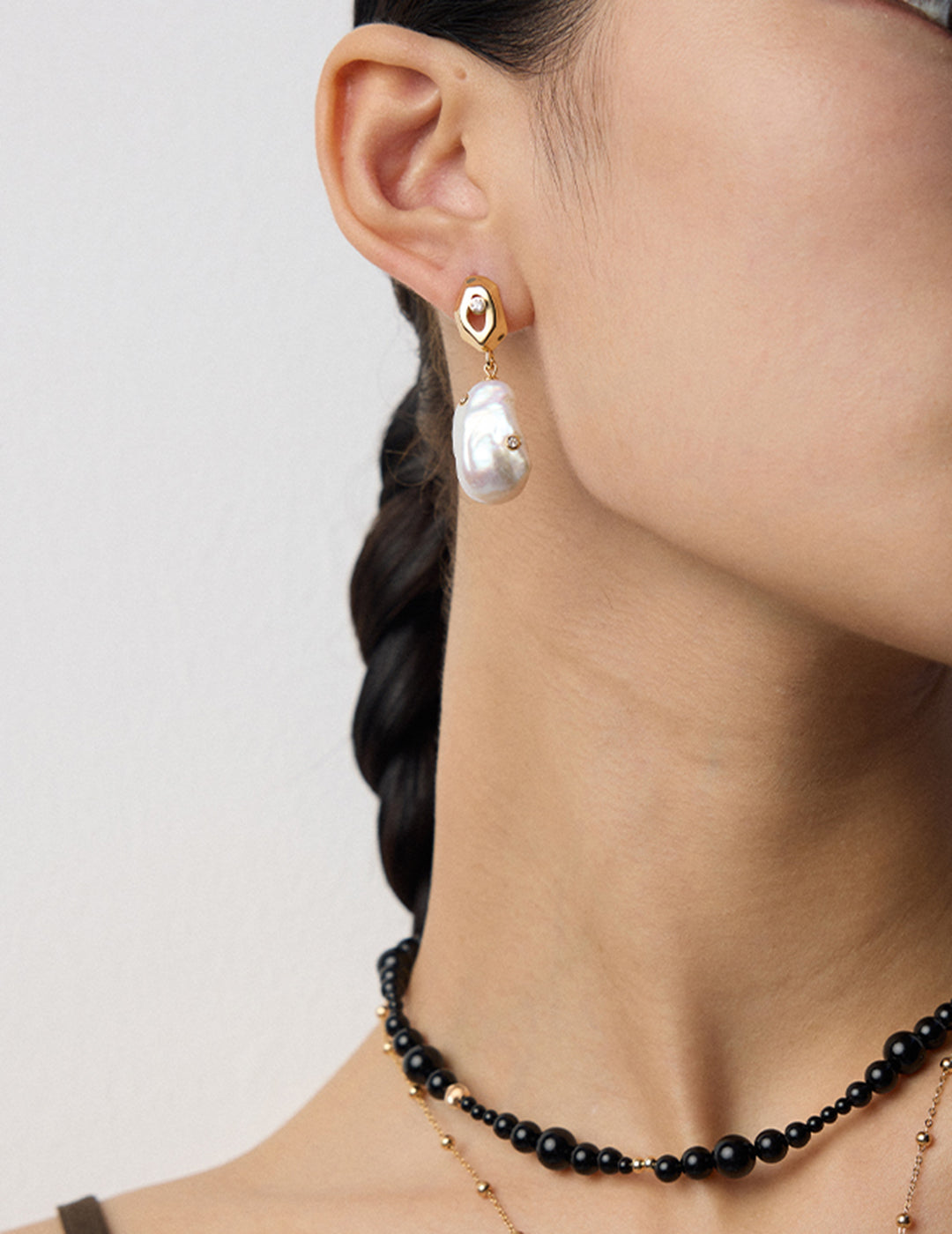 Elegant Irregular Baroque Pearl Dangle Earrings in Gold Settings and Shiny Zircon Accents